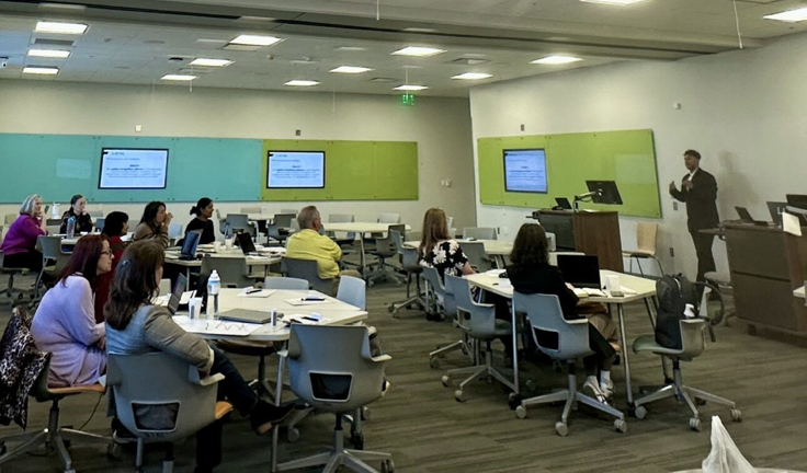 Auburn University faculty and staff working through hands-on prompting exercises